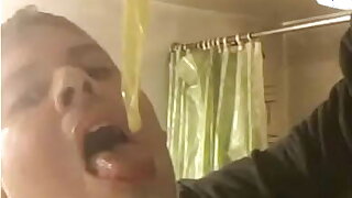 Faggot eats cum filled condom